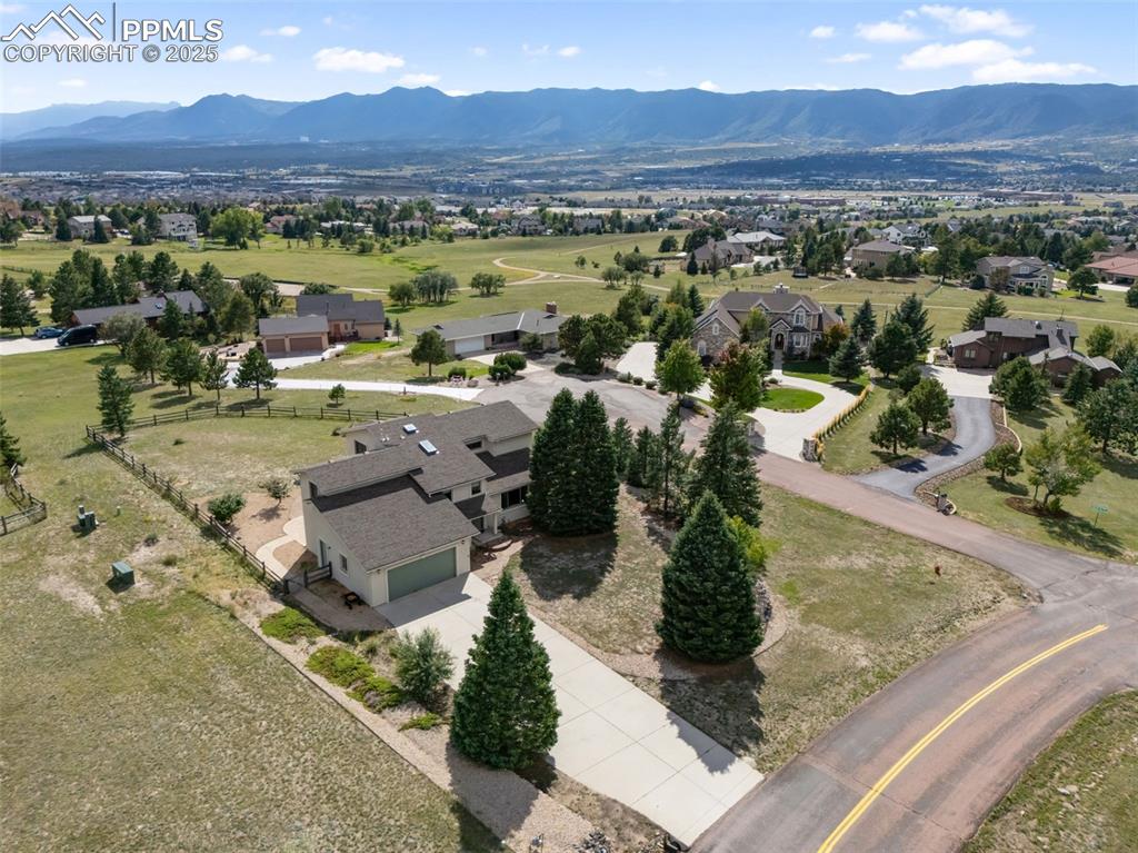 725 Bowstring Road Monument, CO 80132 - Photo 49 of 50 an aerial view of residential houses with outdoor space