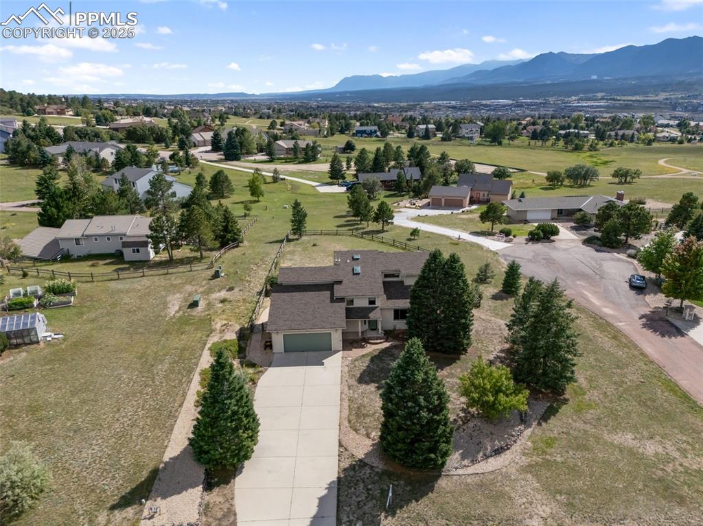 725 Bowstring Road Monument, CO 80132 - Photo 50 of 50 an aerial view of a town with swimming pool