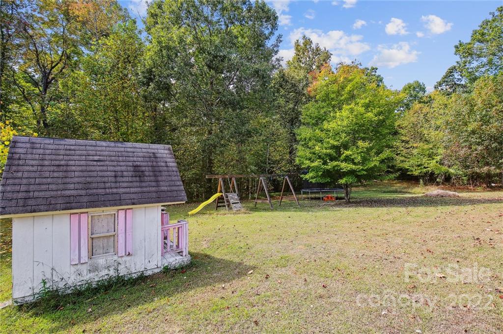 3961 Biggers Road Clover, SC 29710 - Photo 7 of 36 a view of house with backyard space and swimming pool