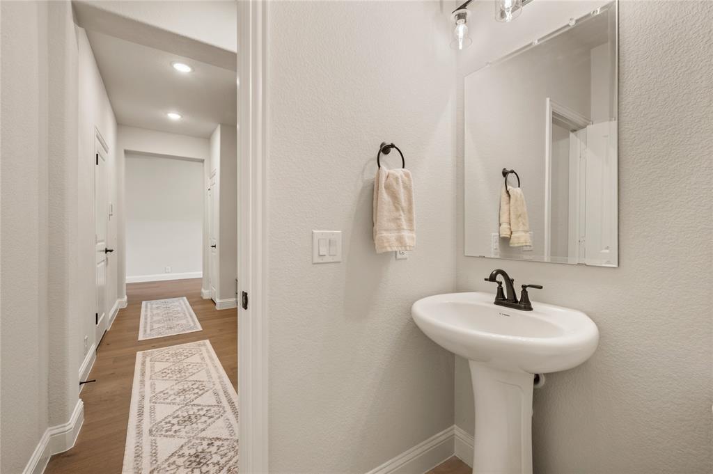 1003 Moss Grv Trail Justin, TX 76247 - Photo 22 of 40 Half Bath - Hall