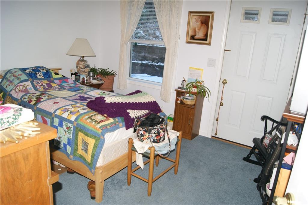 140 Richmond Mills Road Fayette, ME 04349 - Photo 11 of 35 The master bedroom with a door...