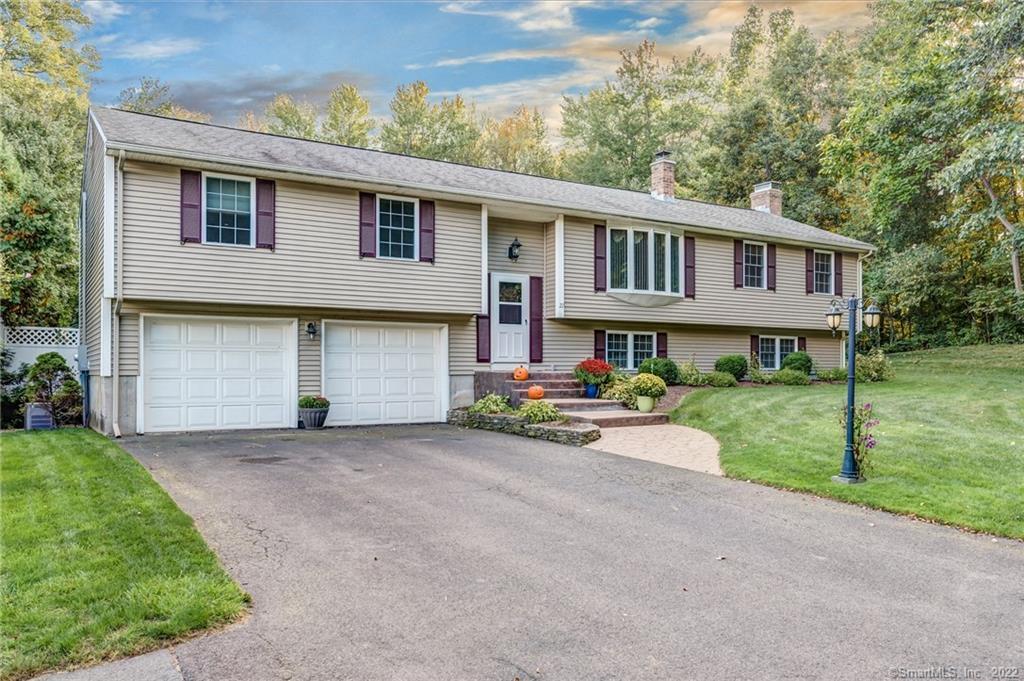 22 Ridgeview Lane Enfield, CT 06082 - Photo 1 of 1 Come see this stunning home....not your run of the mill raised ranch over 2300 SF on a manicured .61 acres !