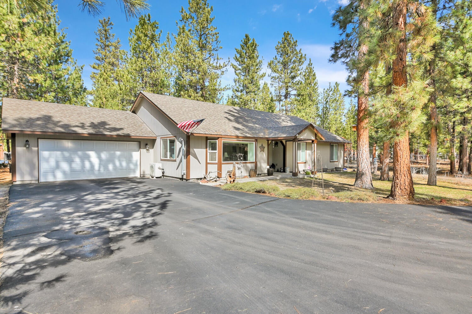 Paved driveway up to the house.
