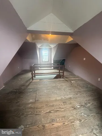 a view of room with a ceiling fan and window