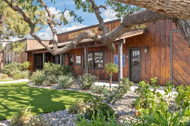 a view of swimming pool with an outdoor space and seating area