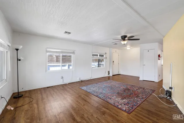 a view of an empty room and window