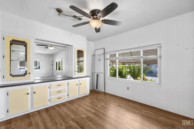 a living room with granite countertop furniture and a large window