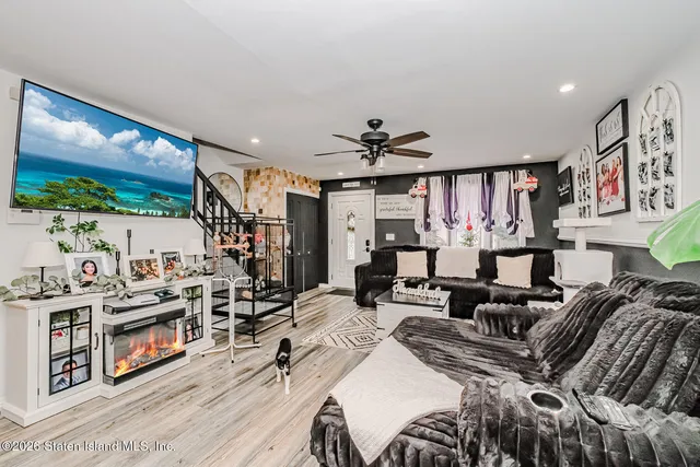 a very nice looking bedroom with furniture and a flat screen tv