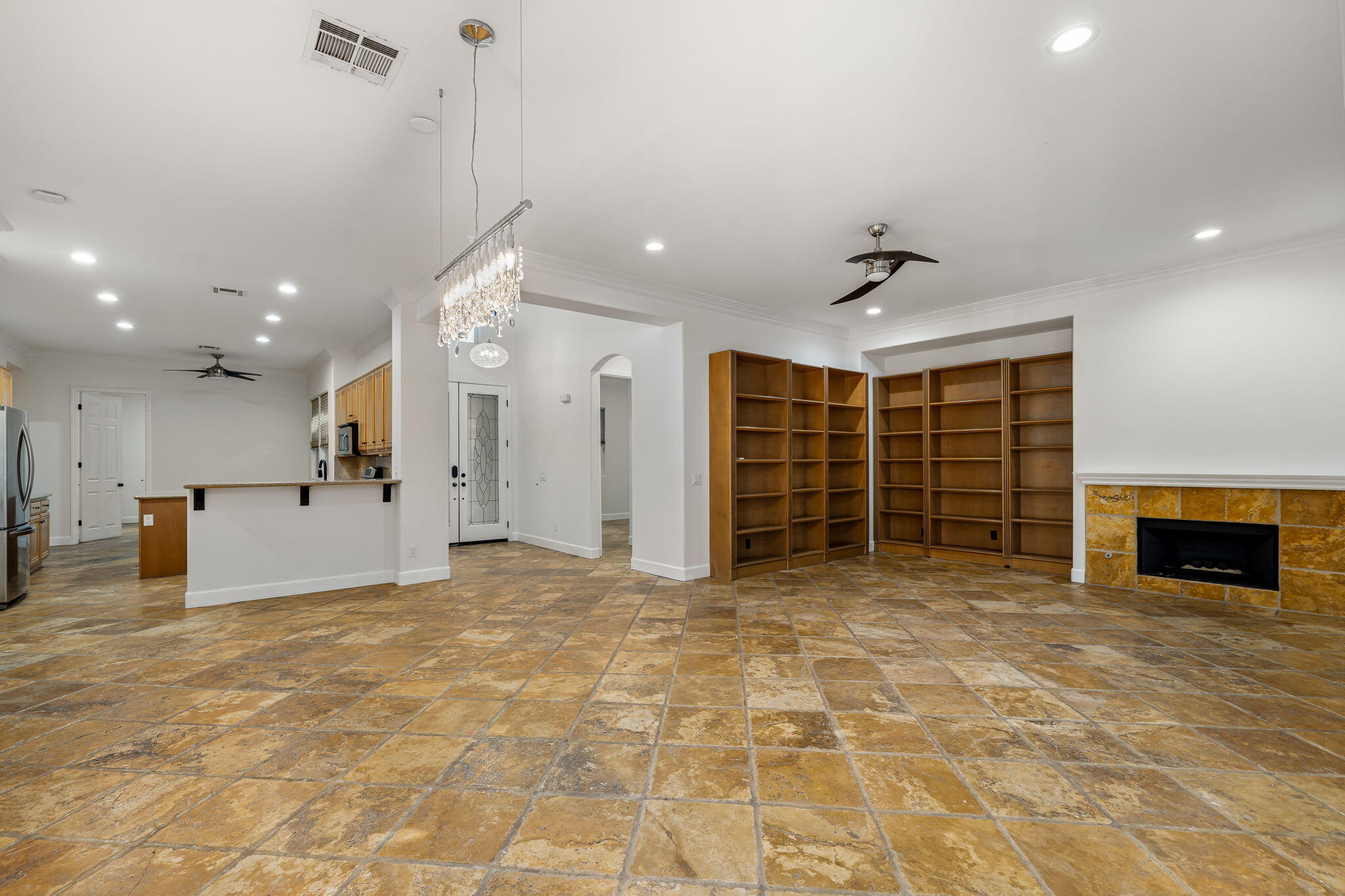 49647 Lewis Road Indio, CA 92201 - Photo 11 of 42 a view of a livingroom with furniture and a fireplace