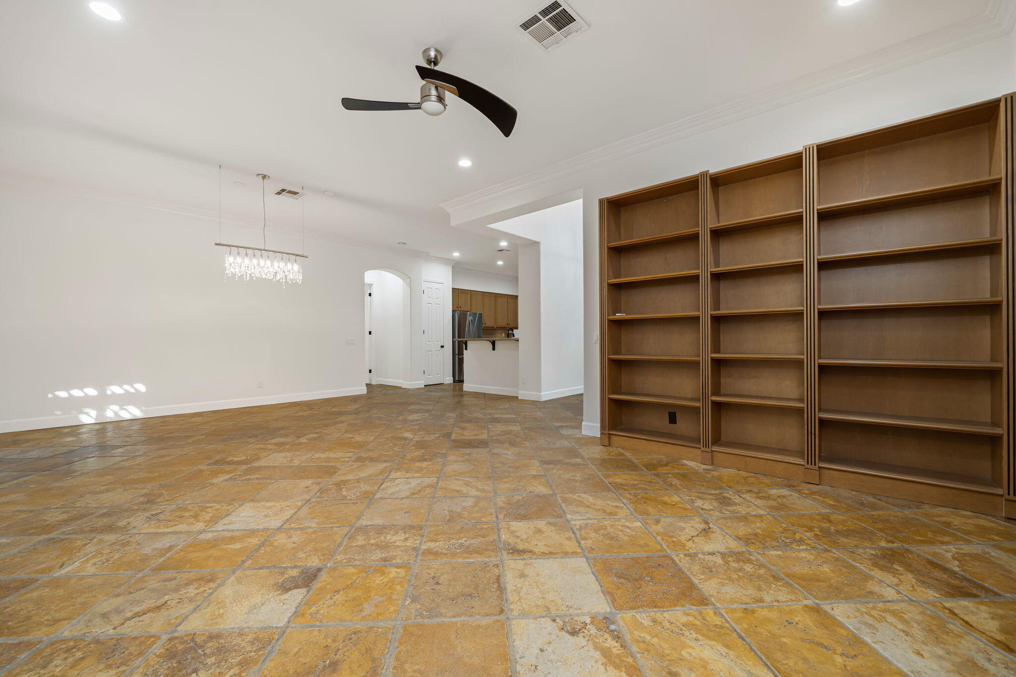 49647 Lewis Road Indio, CA 92201 - Photo 22 of 42 a view of an empty room with a cabinet and a window