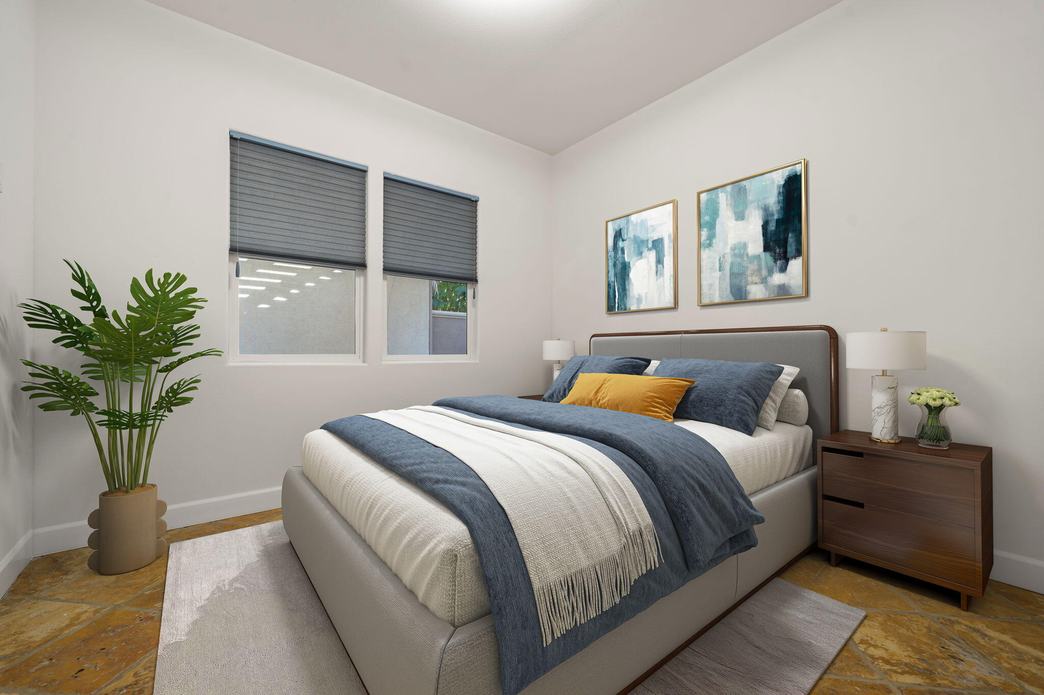 49647 Lewis Road Indio, CA 92201 - Photo 25 of 42 a bedroom with a bed and a potted plant