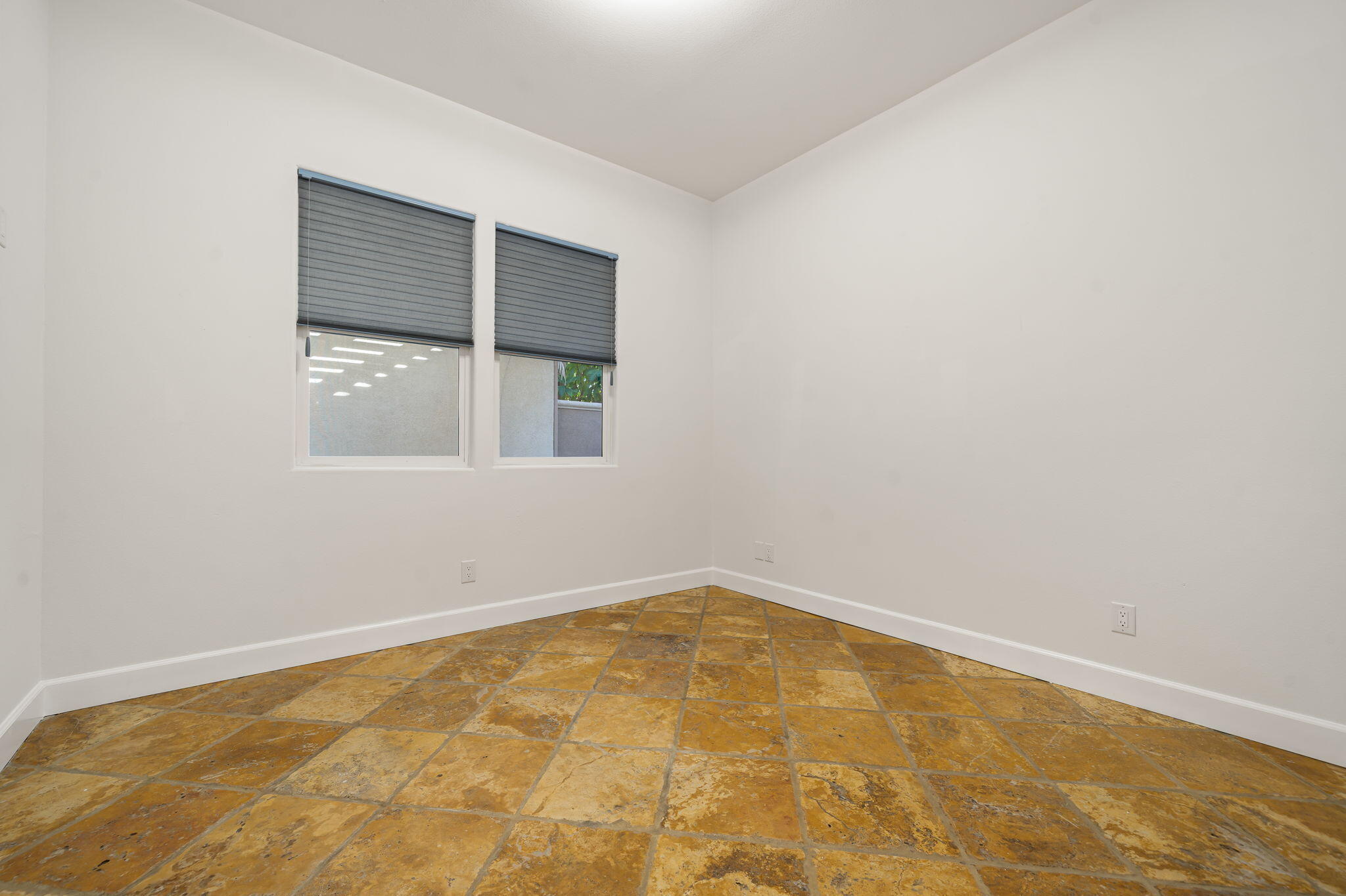 49647 Lewis Road Indio, CA 92201 - Photo 26 of 42 an empty room with a window