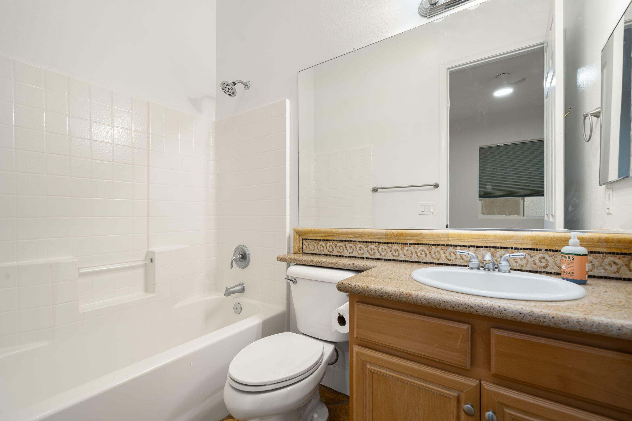49647 Lewis Road Indio, CA 92201 - Photo 27 of 42 a bathroom with a sink a toilet and shower