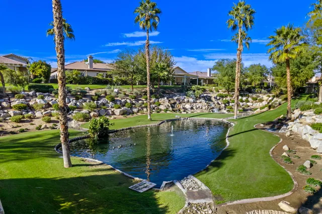 a view of a water fountain and an outdoor space