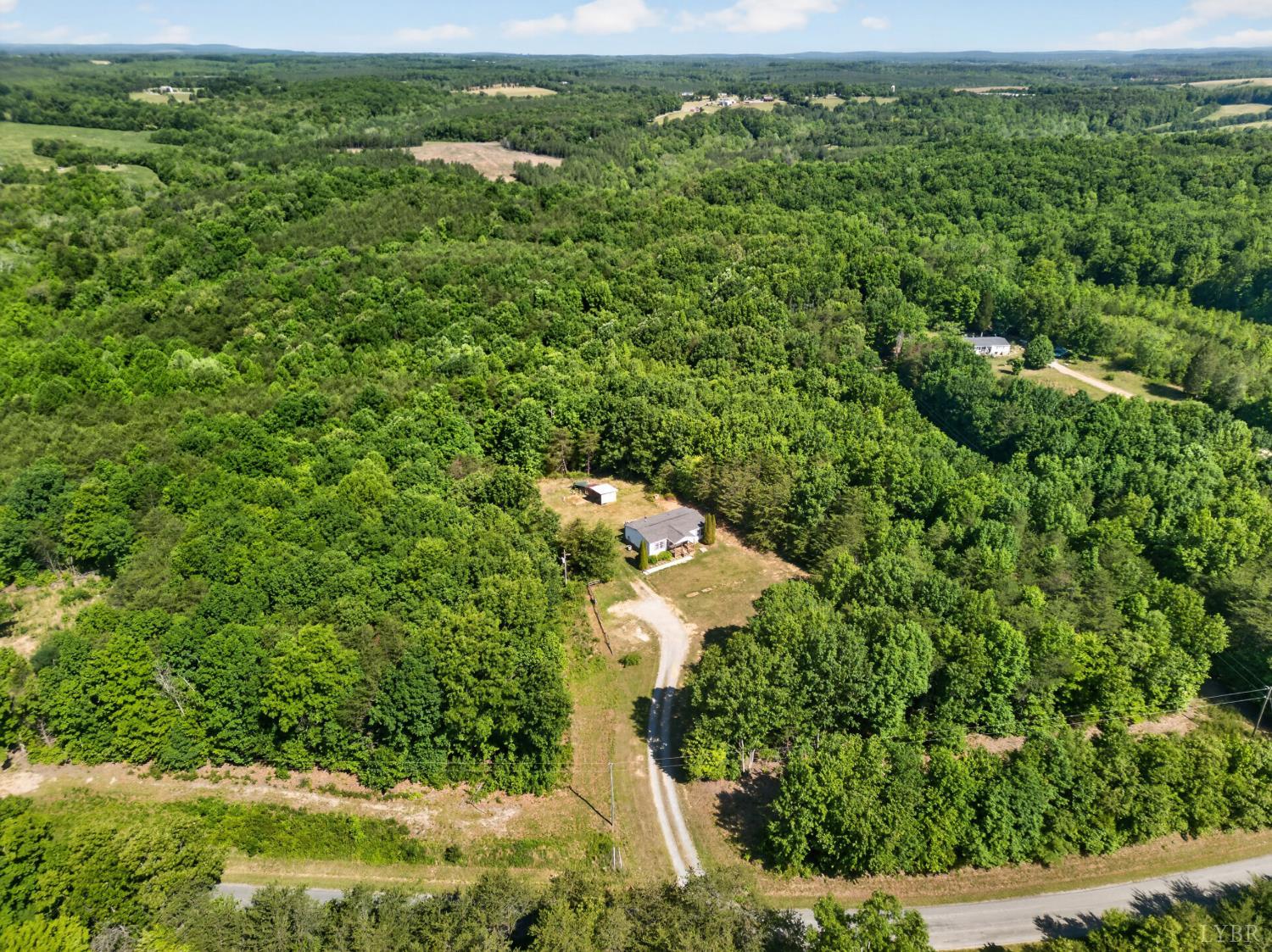 1811 Mohawk Road Gladys, VA 24554 - Photo 47 of 51 an aerial view of a residential houses with outdoor space and trees all around