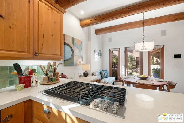 a spacious bathroom with double vanity sinks a large mirror and a shower