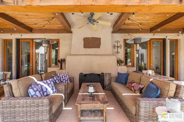 a view of a patio with swimming pool