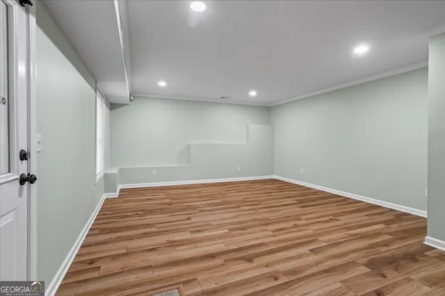 a view of a house with basketball court