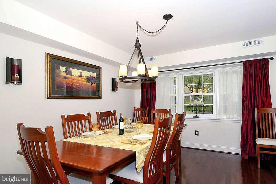 12507 Cedarbrook Lane Laurel, MD 20708 - Photo 11 of 30 Dining Room with Modern Medieval Chandelier