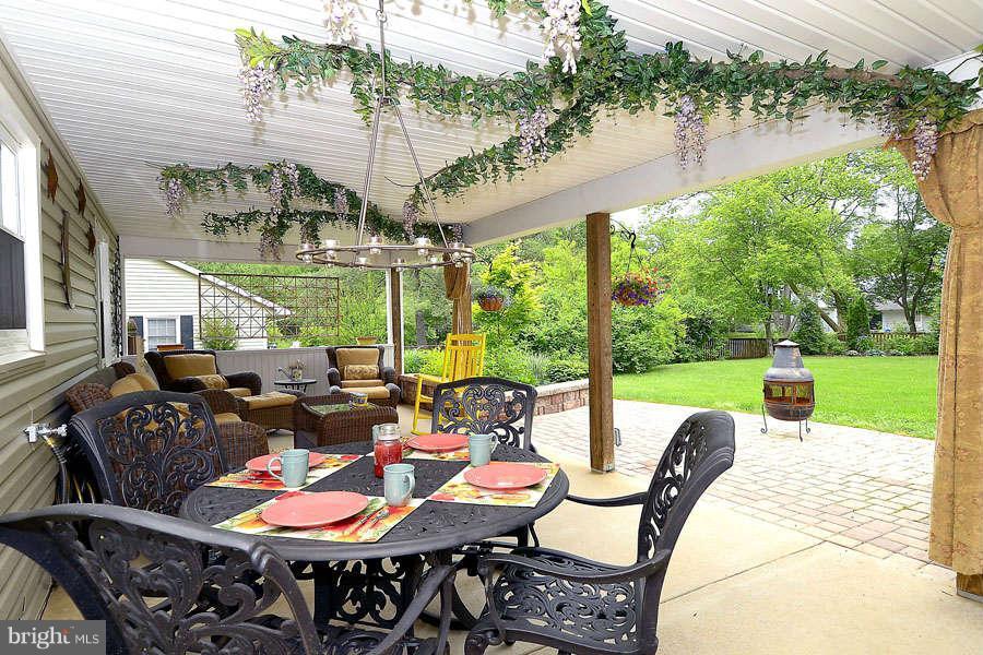 12507 Cedarbrook Lane Laurel, MD 20708 - Photo 17 of 30 Covered Patio for Alfresco Dining