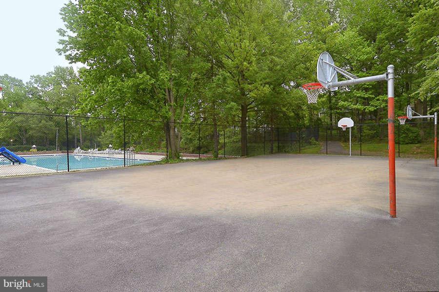 12507 Cedarbrook Lane Laurel, MD 20708 - Photo 29 of 30 Community Pool and Sports Courts