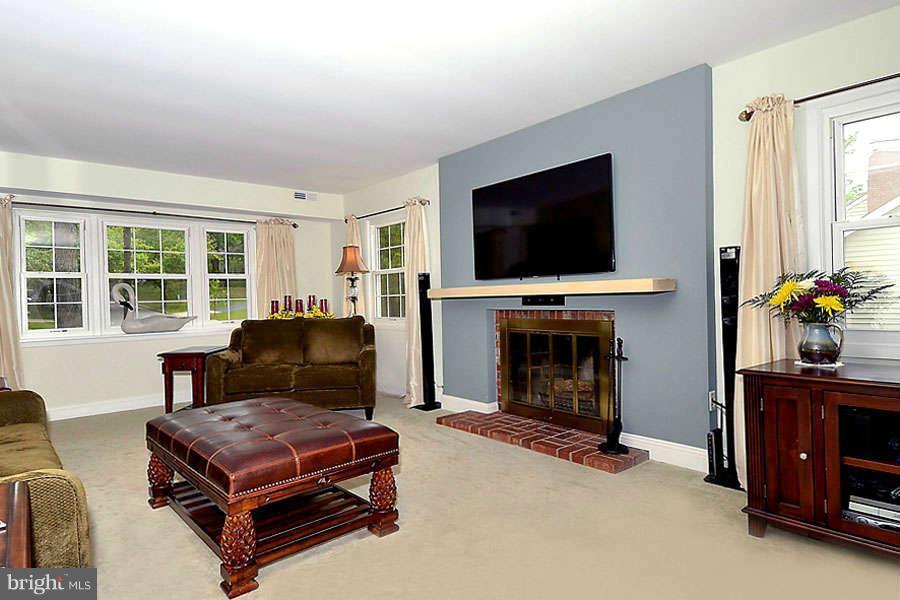 12507 Cedarbrook Lane Laurel, MD 20708 - Photo 10 of 30 Living Room with Gathering Fireplace