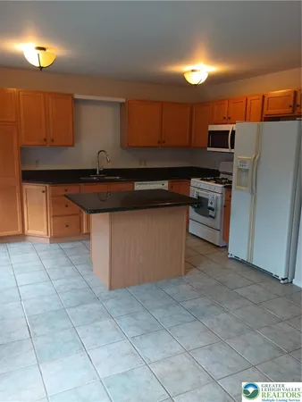 $396,000 | 1590 Pinewind Drive, Lower Macungie Township, PA 18011