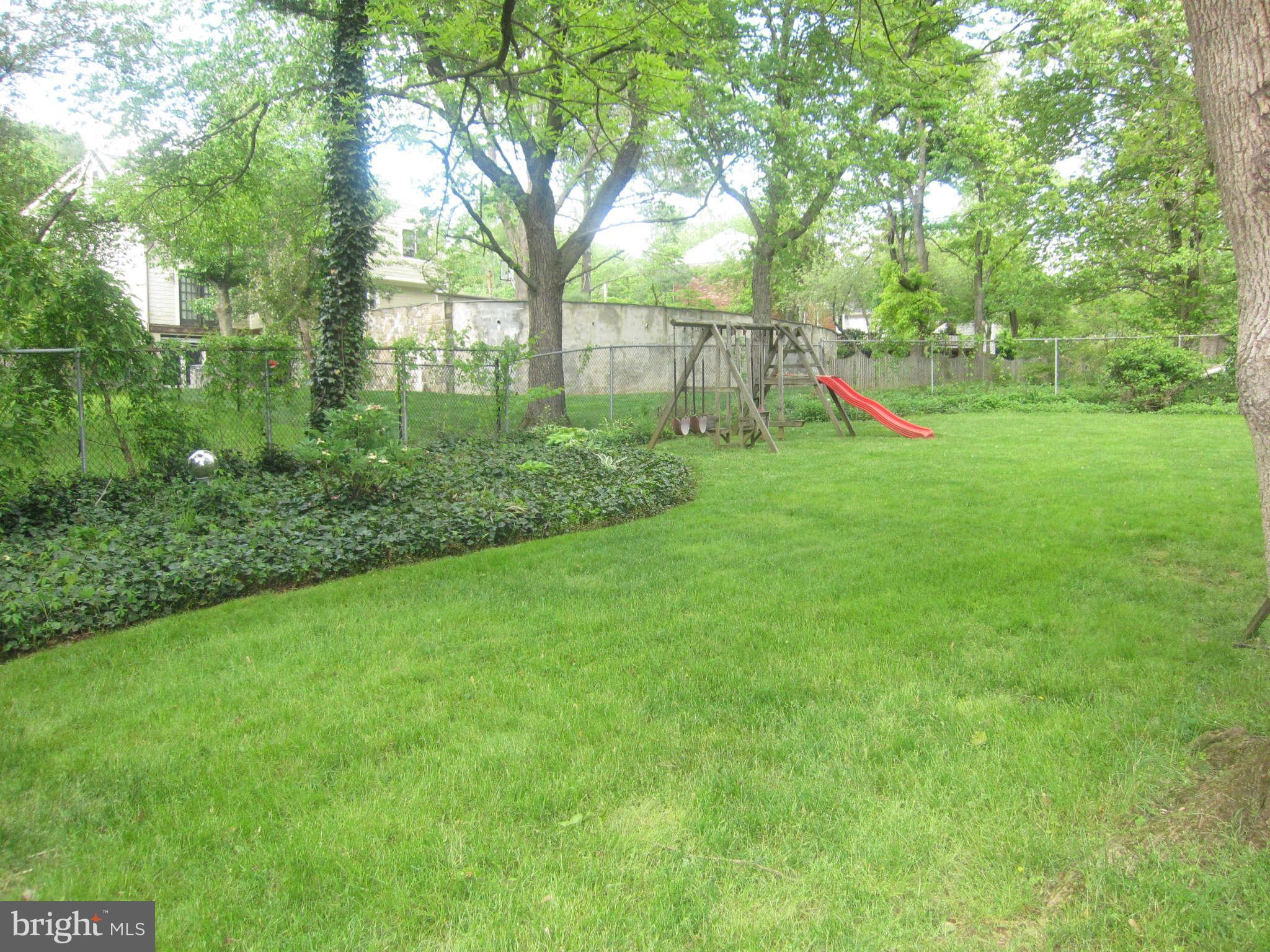709 Bonifant Road Silver Spring, MD 20905 - Photo 26 of 29 Expansive yard with lush lawn, gardens