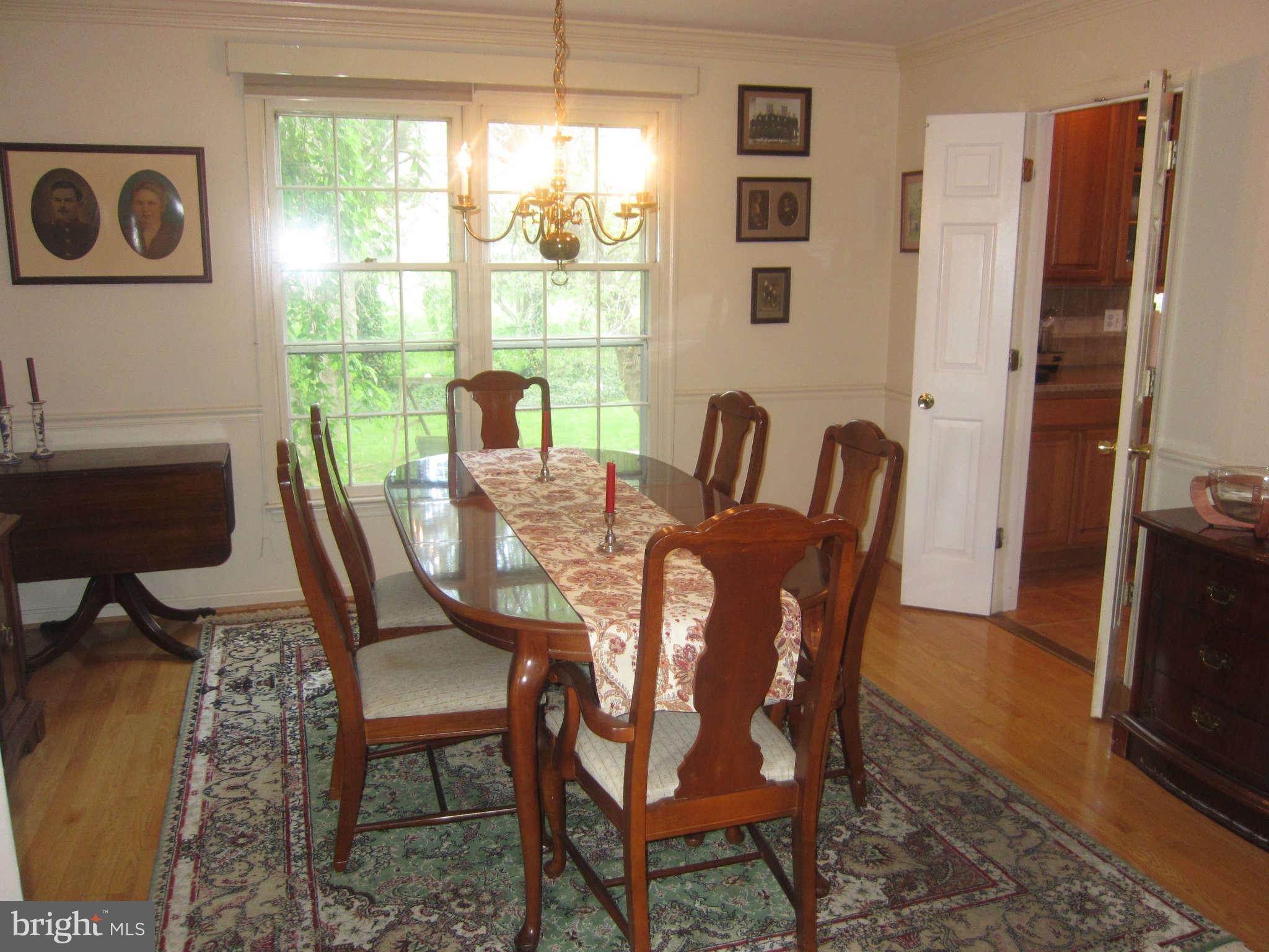 Formal Dining Room opens to kitchen