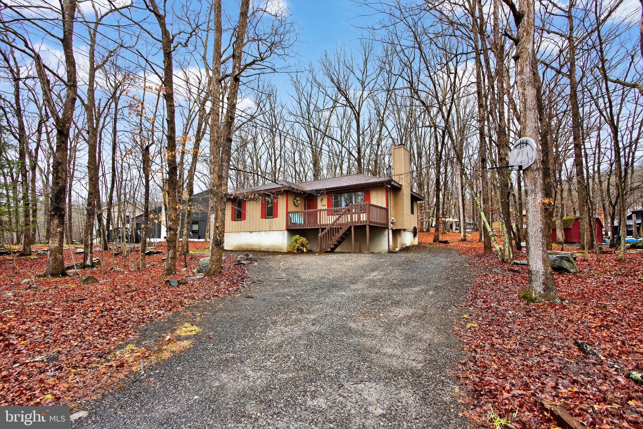244 Canterbury Road Bushkill, PA 18324 - Photo 3 of 45 Charming retreat nestled in serene woods.