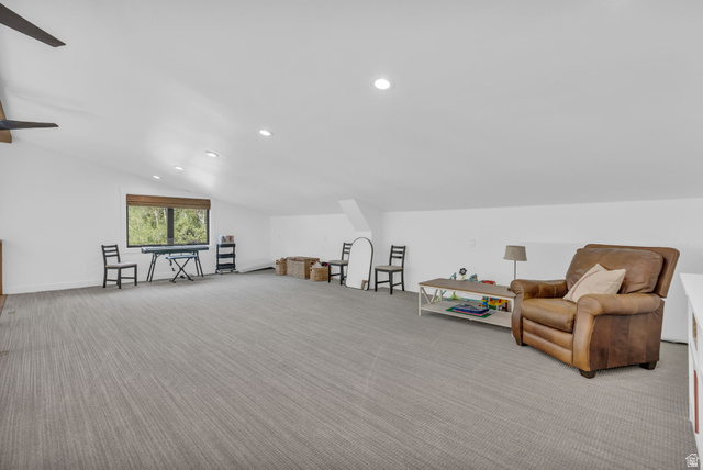 1766 West Tollgate Cyn Road Coalville, UT 84017 - Photo 25 of 59 Spacious room featuring sloped ceilings, recessed lighting, and a large window with natural wood-finish blinds