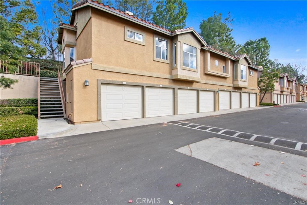 19431 Rue De Valore, Unit 49A Lake Forest, CA 92610 - Photo 23 of 23 a view of a house with a street