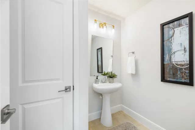 a view of a house with backyard and porch