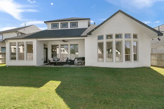 a spacious bathroom with a sink and a yard