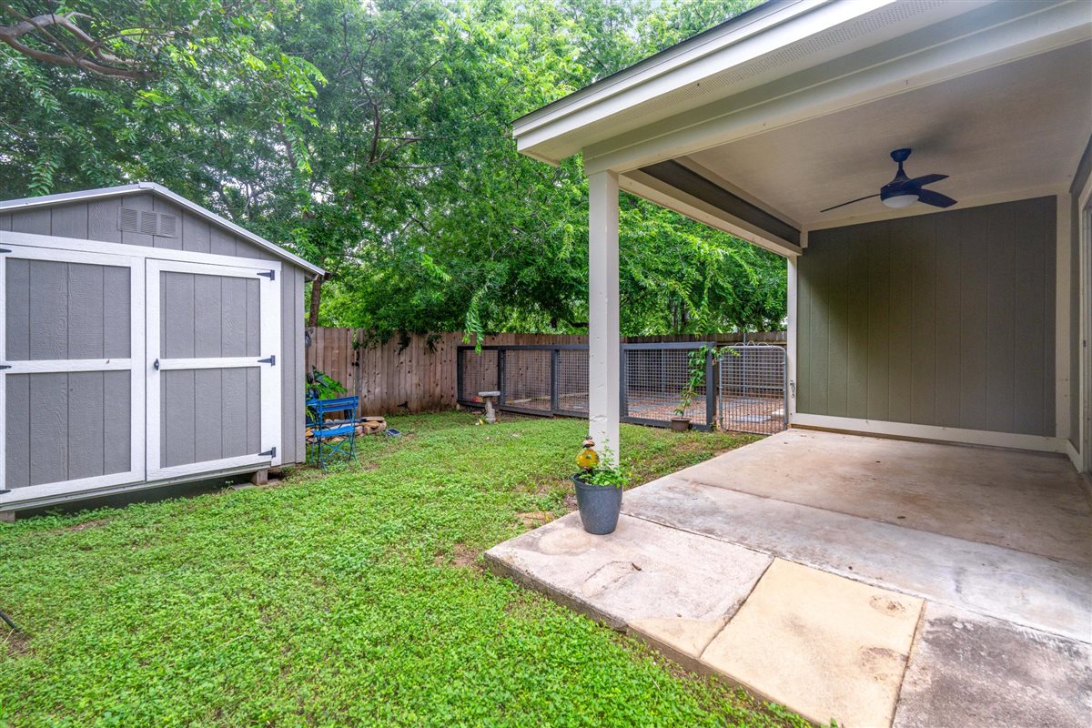 2147 Jasmine Path Round Rock, TX 78664 - Photo 31 of 36 A storage shed in the backyard provides ample space for tools, lawn equipment, and outdoor gear.