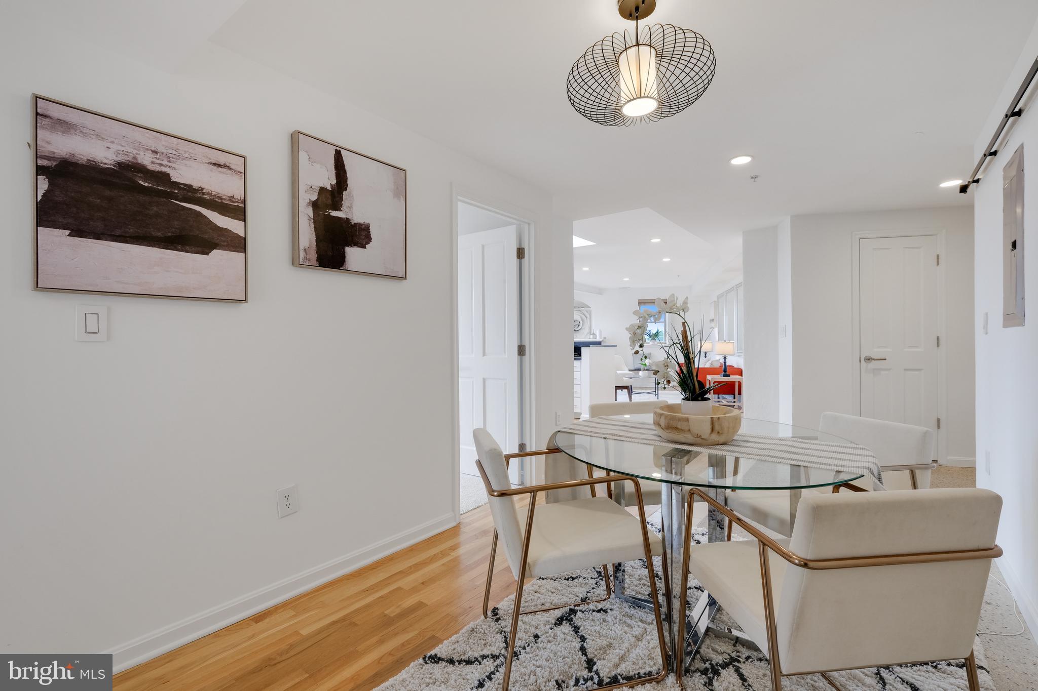 70 Rhode Island Avenue Northwest, Unit 502 Washington, DC 20001 - Photo 14 of 36 a dining room with furniture and window