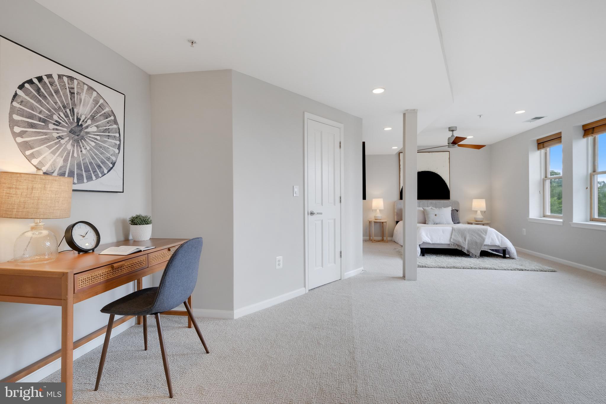 70 Rhode Island Avenue Northwest, Unit 502 Washington, DC 20001 - Photo 16 of 36 a living room with furniture and a table
