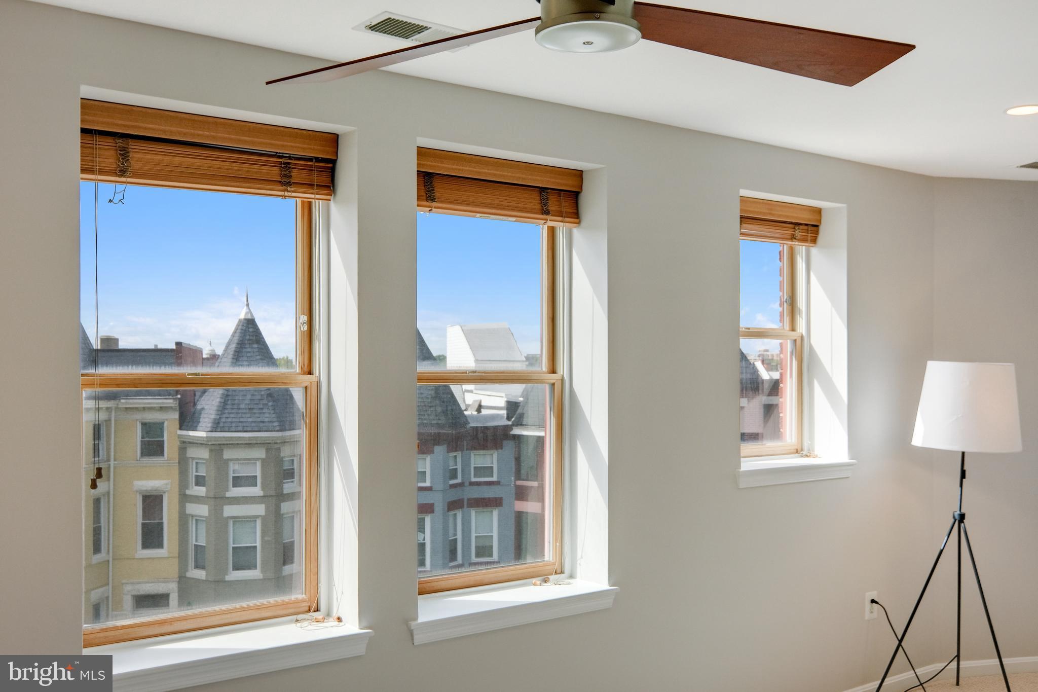 70 Rhode Island Avenue Northwest, Unit 502 Washington, DC 20001 - Photo 19 of 36 a view of a livingroom with furniture and windows