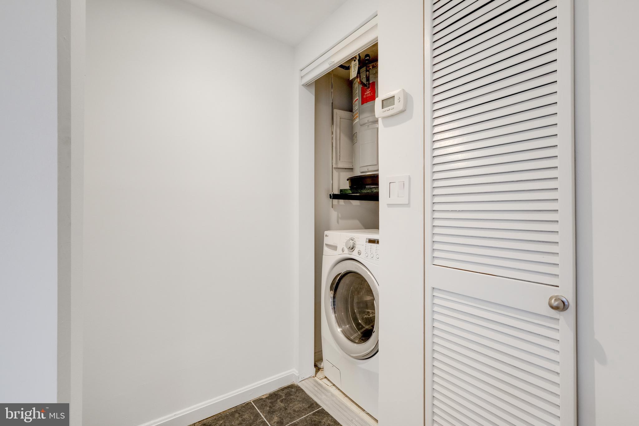 70 Rhode Island Avenue Northwest, Unit 502 Washington, DC 20001 - Photo 26 of 36 a utility room with dryer and washer