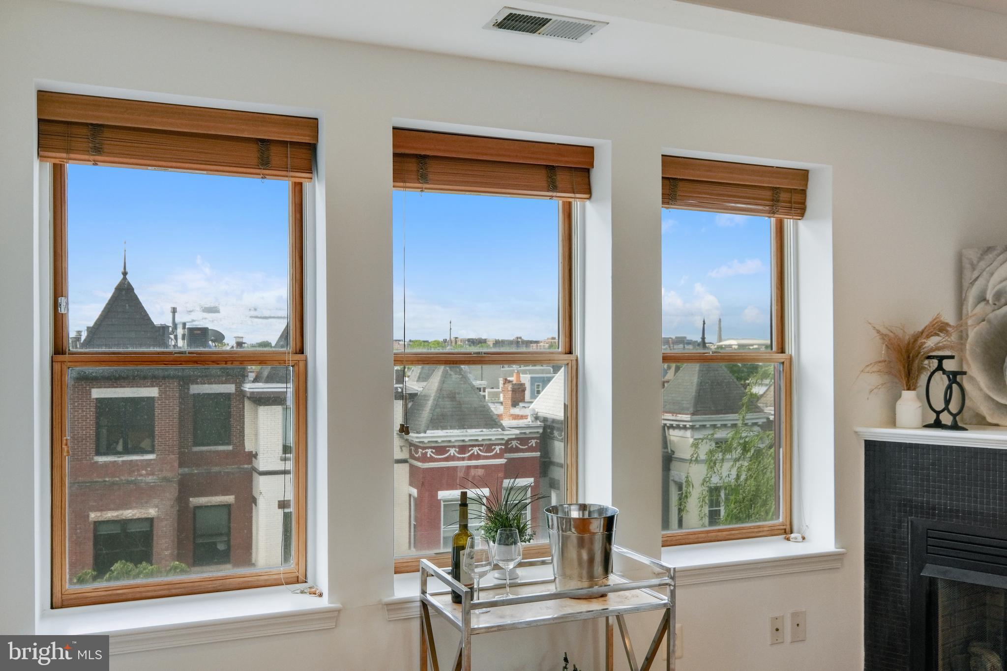 70 Rhode Island Avenue Northwest, Unit 502 Washington, DC 20001 - Photo 6 of 36 a balcony with furniture and a window