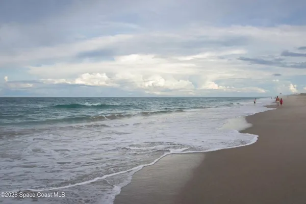 a view of beach and ocean