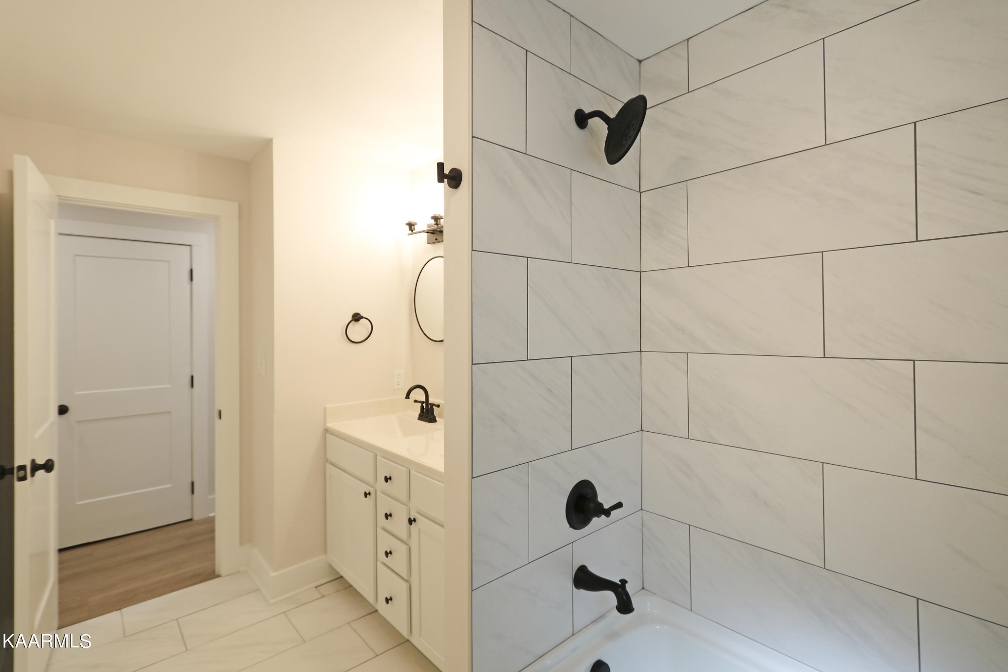 10604 Rutledge Pike Corryton, TN 37721 - Photo 13 of 19 a bathroom with a shower and a mirror