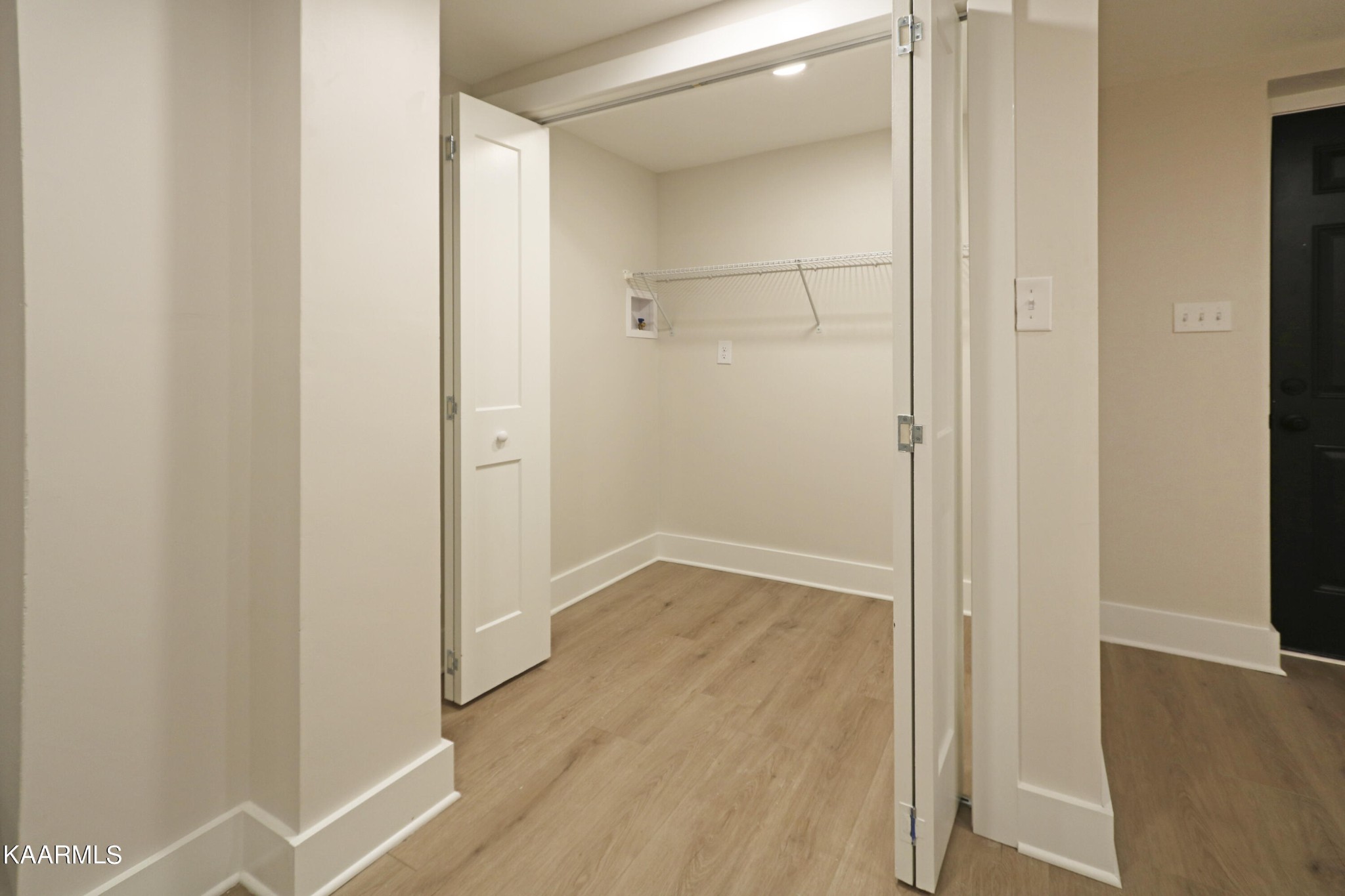 10604 Rutledge Pike Corryton, TN 37721 - Photo 15 of 19 an empty room with wooden floor