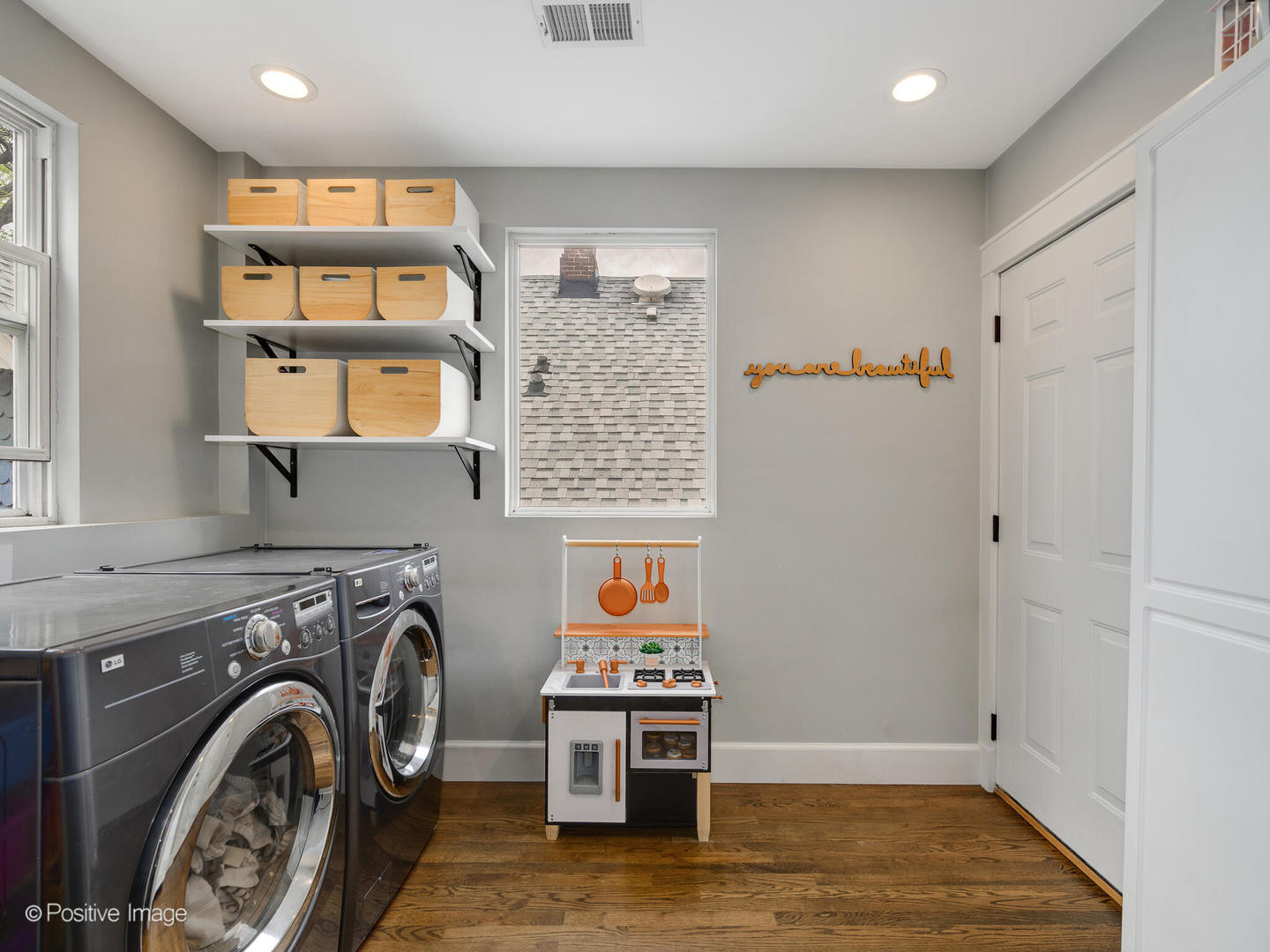 3903 North Seeley Avenue, Unit 3 Chicago, IL 60618 - Photo 13 of 20 a view of a hallway with washer and dryer