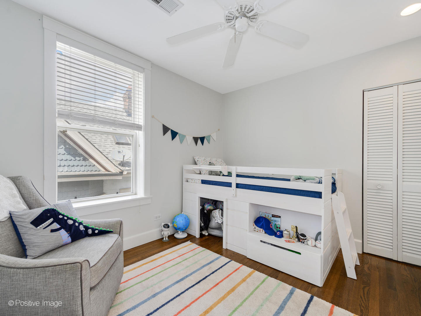 3903 North Seeley Avenue, Unit 3 Chicago, IL 60618 - Photo 16 of 20 a living room with furniture and a fireplace
