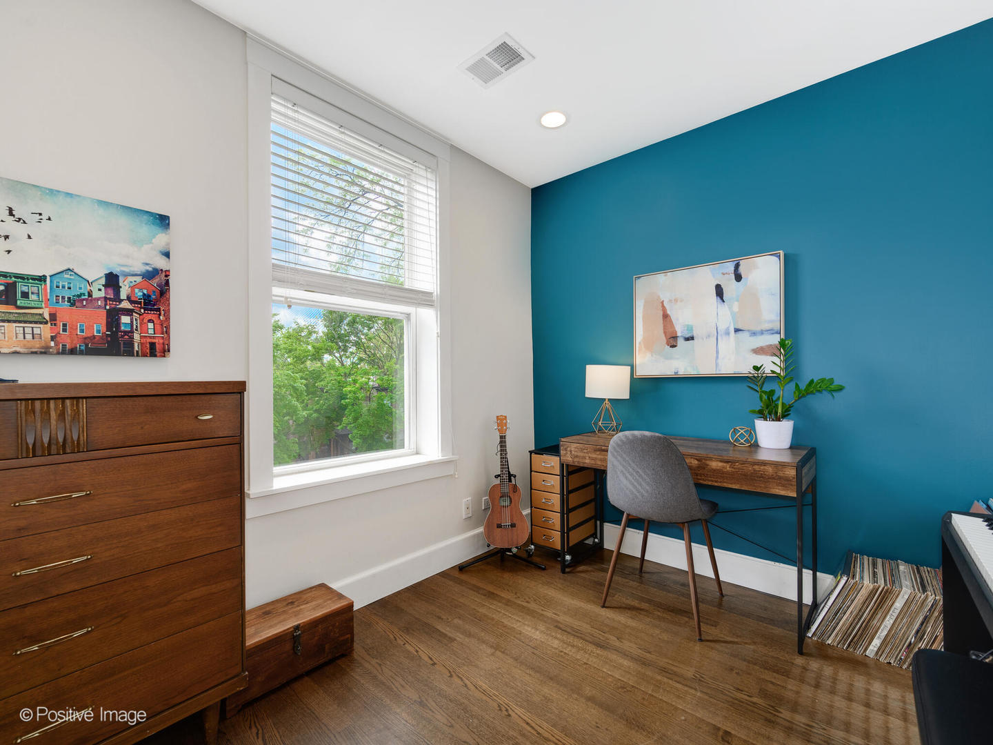 3903 North Seeley Avenue, Unit 3 Chicago, IL 60618 - Photo 17 of 20 a workspace with furniture and a window