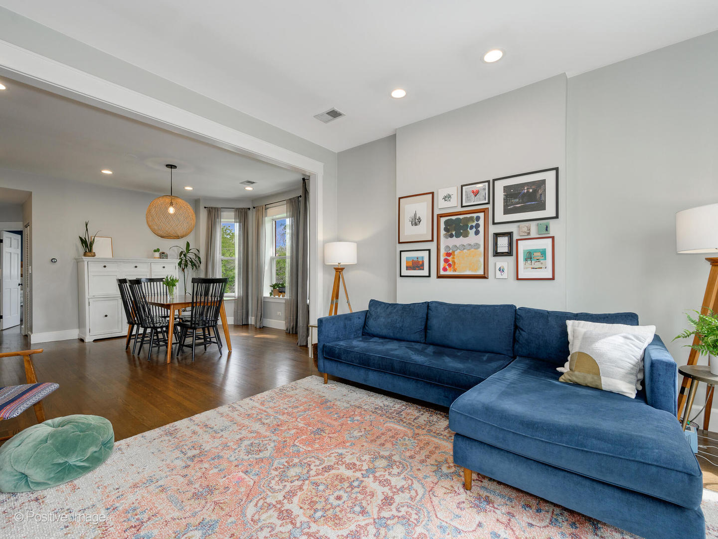 3903 North Seeley Avenue, Unit 3 Chicago, IL 60618 - Photo 5 of 20 a living room with furniture and kitchen view