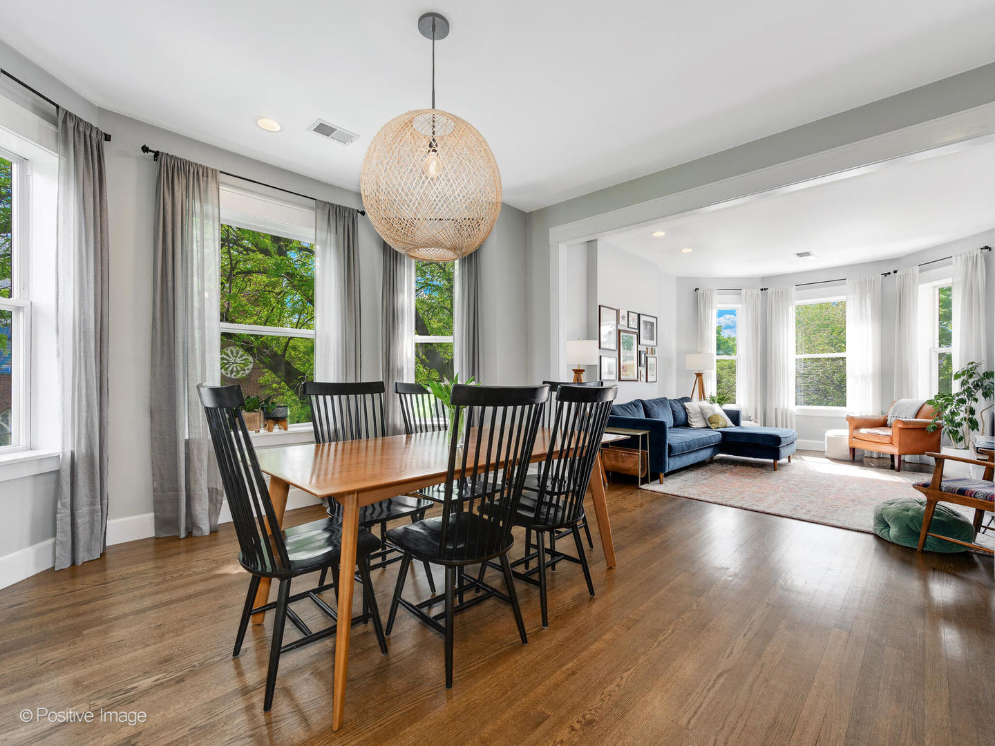 3903 North Seeley Avenue, Unit 3 Chicago, IL 60618 - Photo 6 of 20 a view of a dining room with furniture window and wooden floor