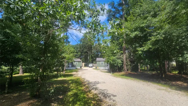 a view of road with trees