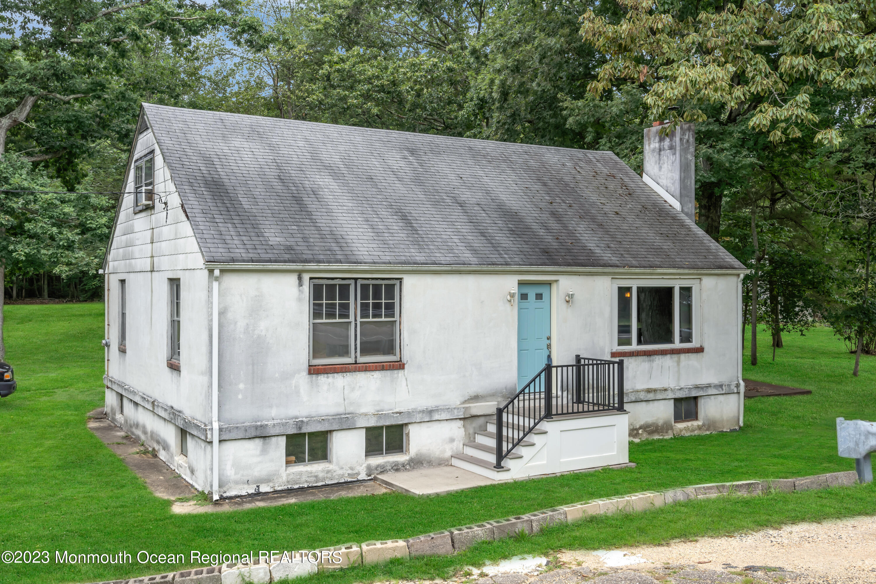 674 Harmony Road Jackson, NJ 08527 - Photo 39 of 43 a view of house with backyard and a garden